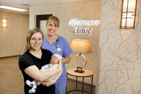 Paige and Sawyer Wilhelmy with Jen Nylund, RN, at St. Luke’s Birthing Center just outside the AfterCare Clinic