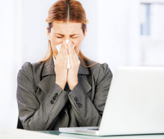 A Woman Sneezing 