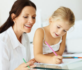 A Mom Helping Her Daughter With Homework 