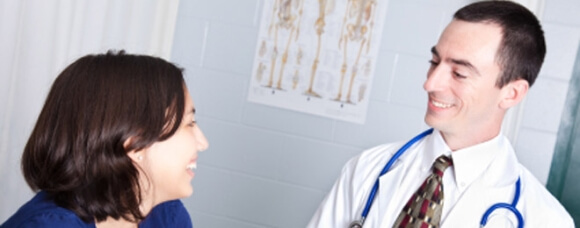 Patient talking to her doctor