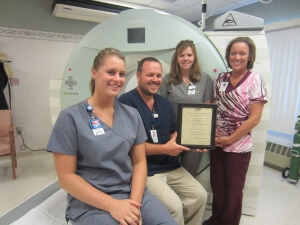 Radiologic technologists Kelsey Raycraft, Victor Murray, Krista Falk, Sarah Edlund.
