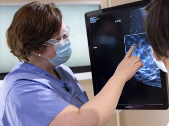 Provider reviewing bones with patient