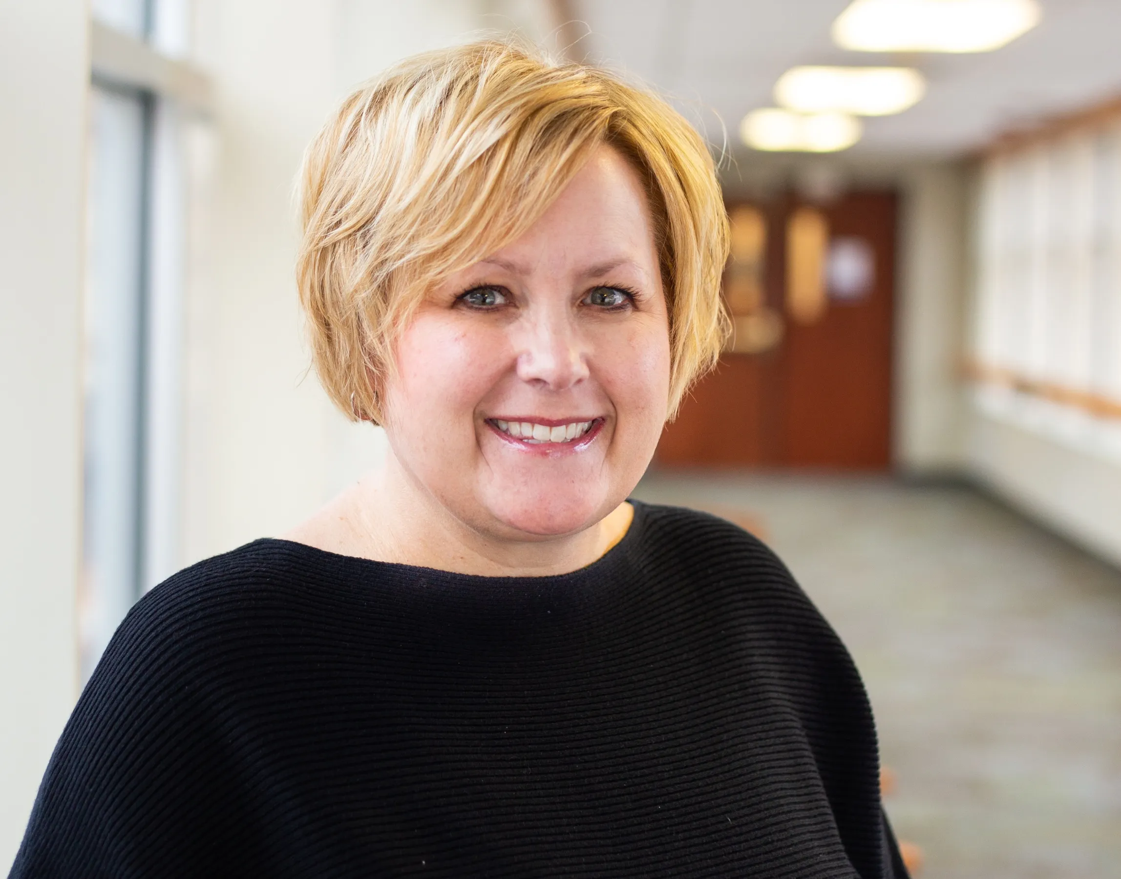 Mollie, our St. Luke's RN Recruiter, smiles at St. Luke's Hospital.