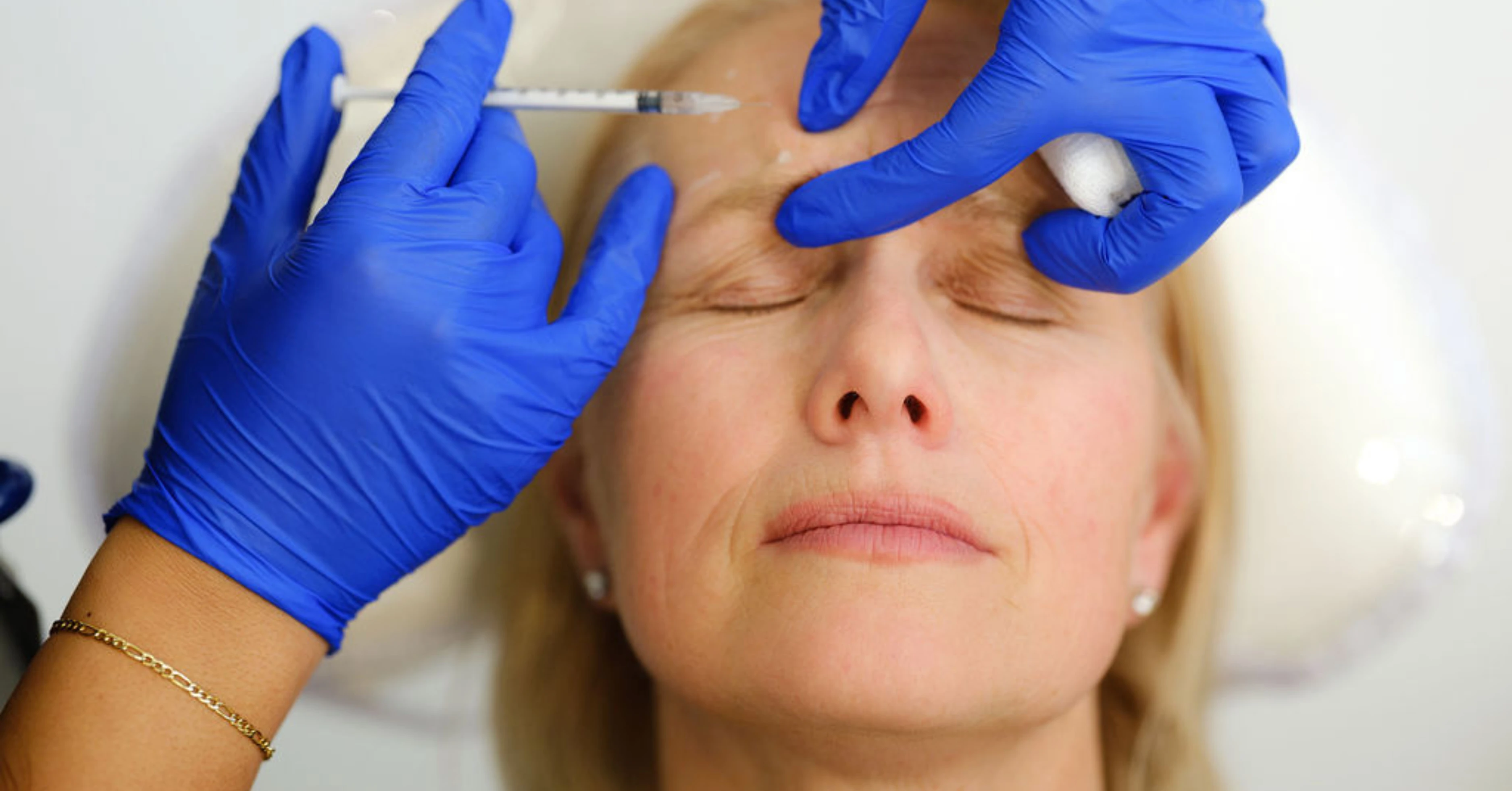 Woman receiving injectable treatment at St. Luke's Rejuvenation Center.